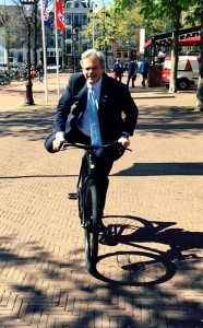 getting onto an electric bike in Amsterdam